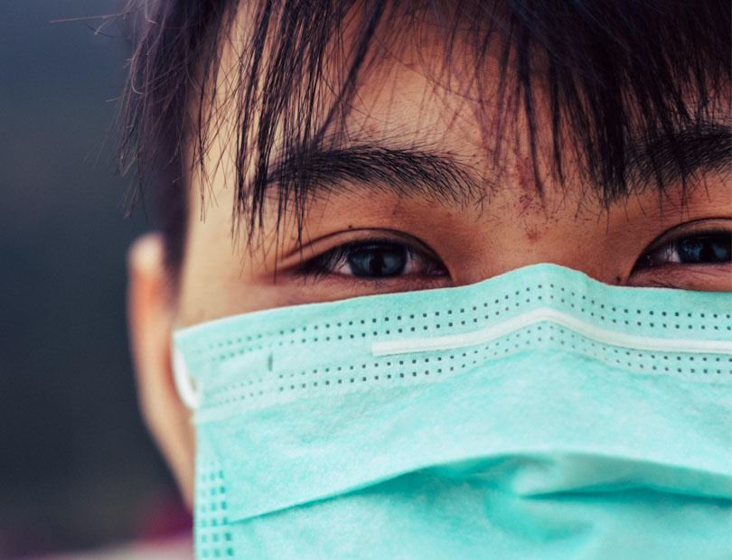 Health care worker wearing a mask